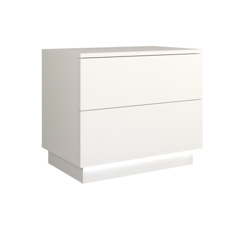 Szafka SN-306-BIEL-MAT+LED z włączonym, delikatnym oświetleniem widoczna w eleganckim półprofilu.